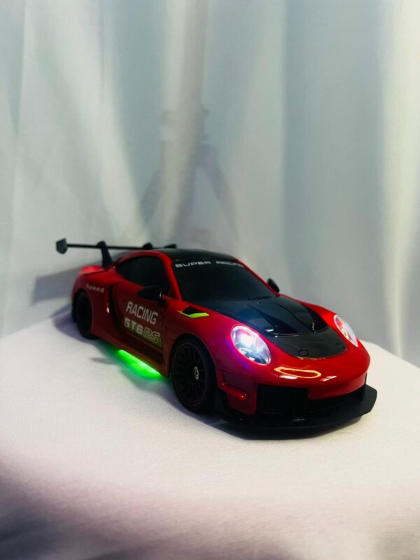 WhatsApp Image 2026-02-14 at 19.57.36 (1) Porsche 911 GT3 RS Style RC Drift Car 1:24 Spray Model 20KM/H 4WD LED Remote Control Racing Car 2026 | Best RC Drift Car in Nepal – TechRex NP