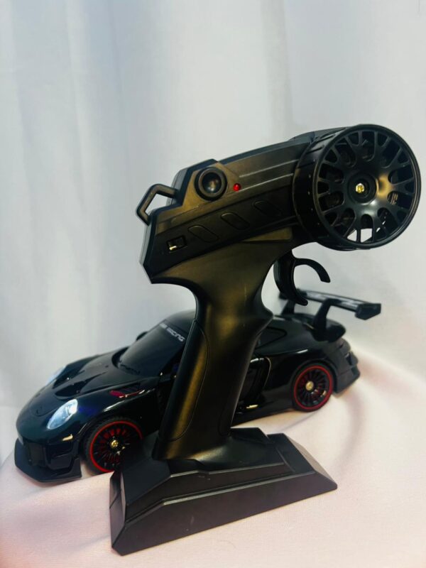 WhatsApp Image 2026-02-14 at 19.57.37 Porsche 911 GT3 RS Style RC Drift Car 1:24 Spray Model 20KM/H 4WD LED Remote Control Racing Car 2026 | Best RC Drift Car in Nepal – TechRex NP