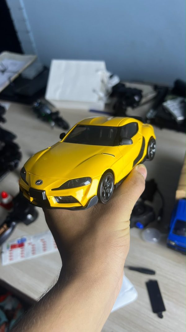 9f21c599-ce6f-4e58-91c8-c04cd753b40e Toyota Supra 1:24 RC Drift Car – 4WD Rechargeable Remote Control Racing Car with LED Lights – Yellow -